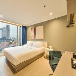 Bright hotel bedroom, Room 8, with minimalist decor