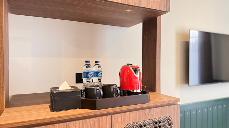 Modern hotel room9 with a window overlooking the city