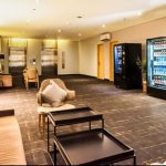 A modern hotel lounge with a cozy seating area