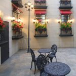 Outdoor dining at the Secret Garden with string lights