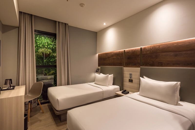 Superior twin hotel room with two single beds