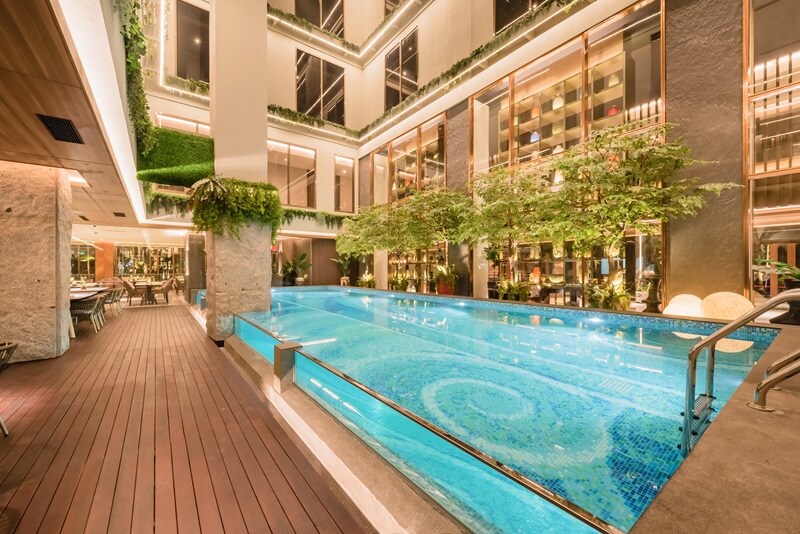 Rooftop swimming pool with a city skyline view