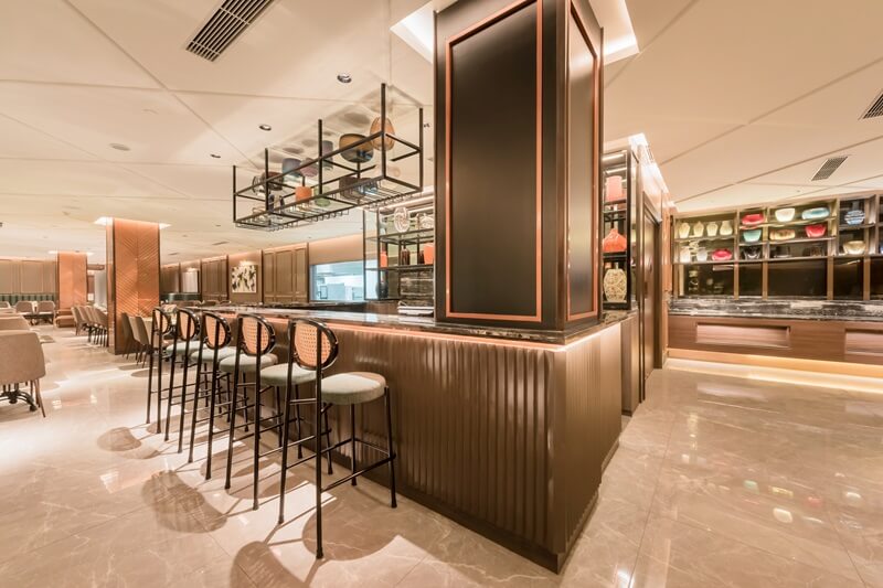 Interior of Tanamera Coffee shop with red sign