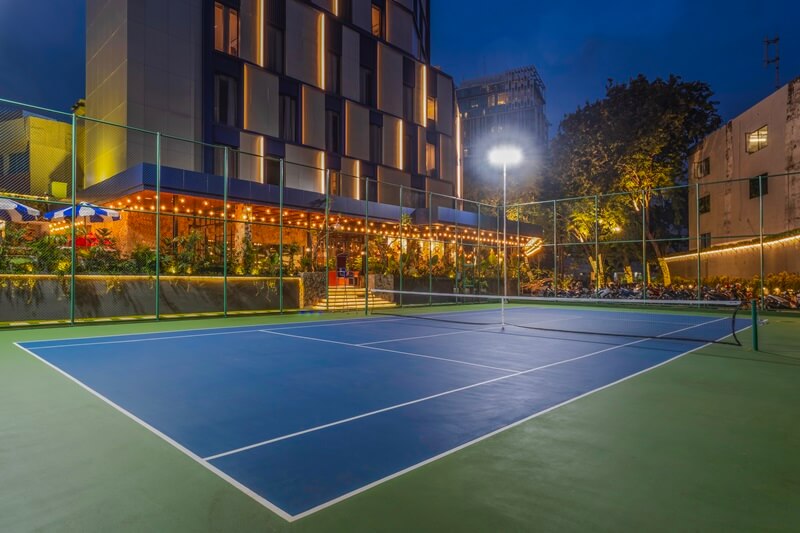 Outdoor tennis court at the Ashley Hotel
