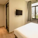 A modern YBTA Deluxe Double hotel room