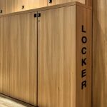 YBTA Locker Room with wooden lockers and bench