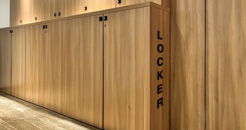 YBTA Locker Room with wooden lockers and bench