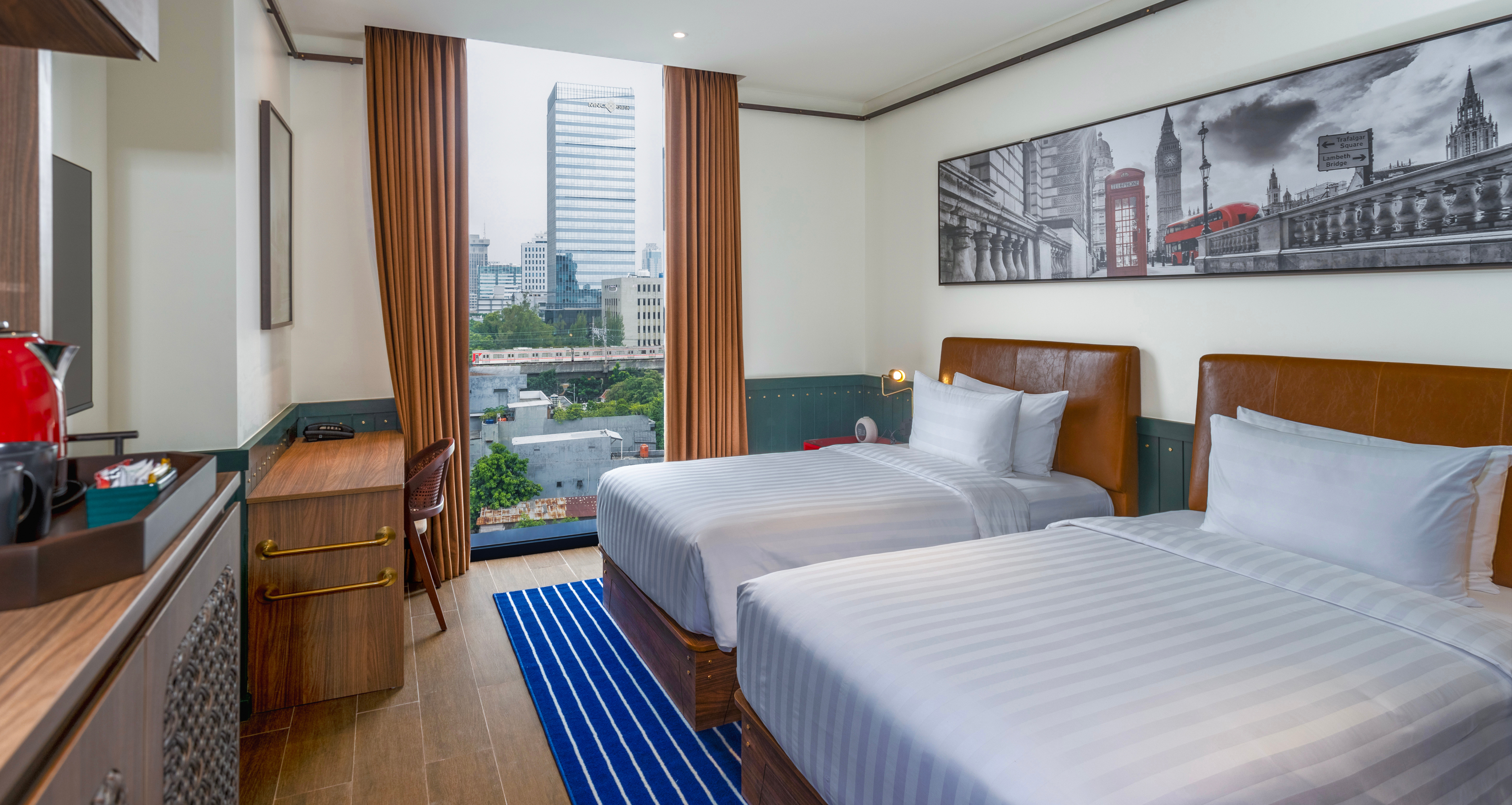 Skyline view twin room at the Ashley Tugu Tani hotel