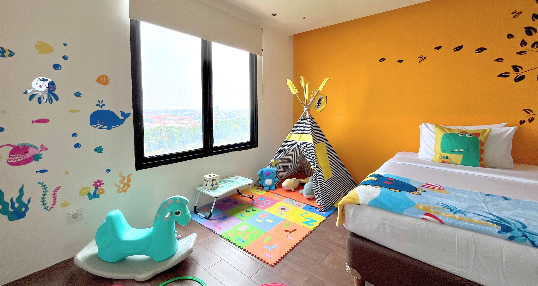 Modern hotel bedroom at Ashley Hotel Group