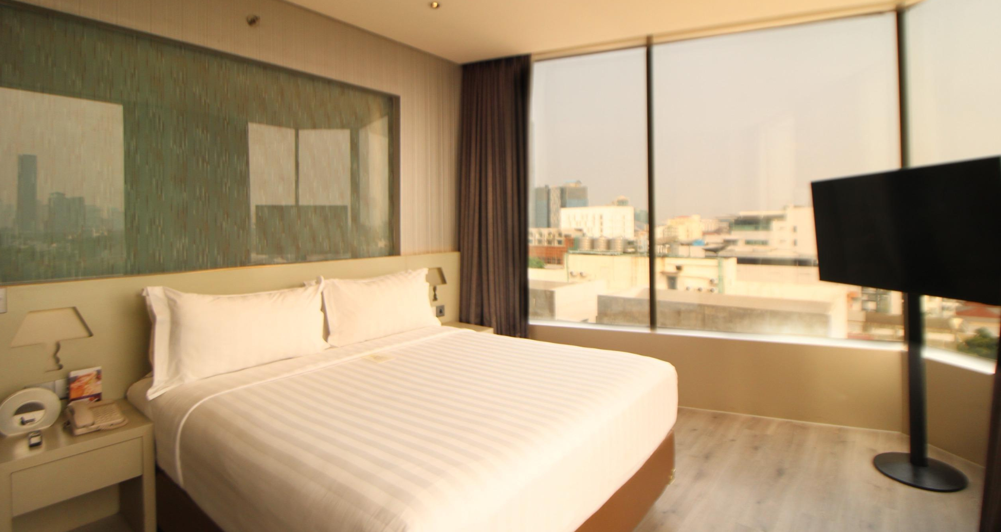Ashley Hotel Group executive queen room with a city view