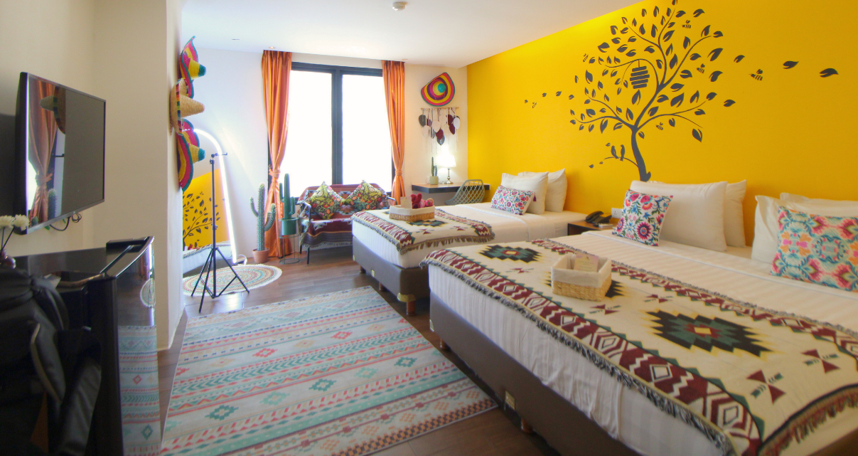 Modern hotel bedroom at Ashley Hotel Group